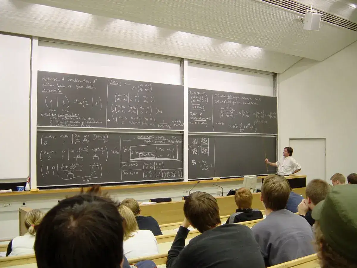 A mathematics lecture. The topics a lecturer spends the most time on tend to be the ones examined.