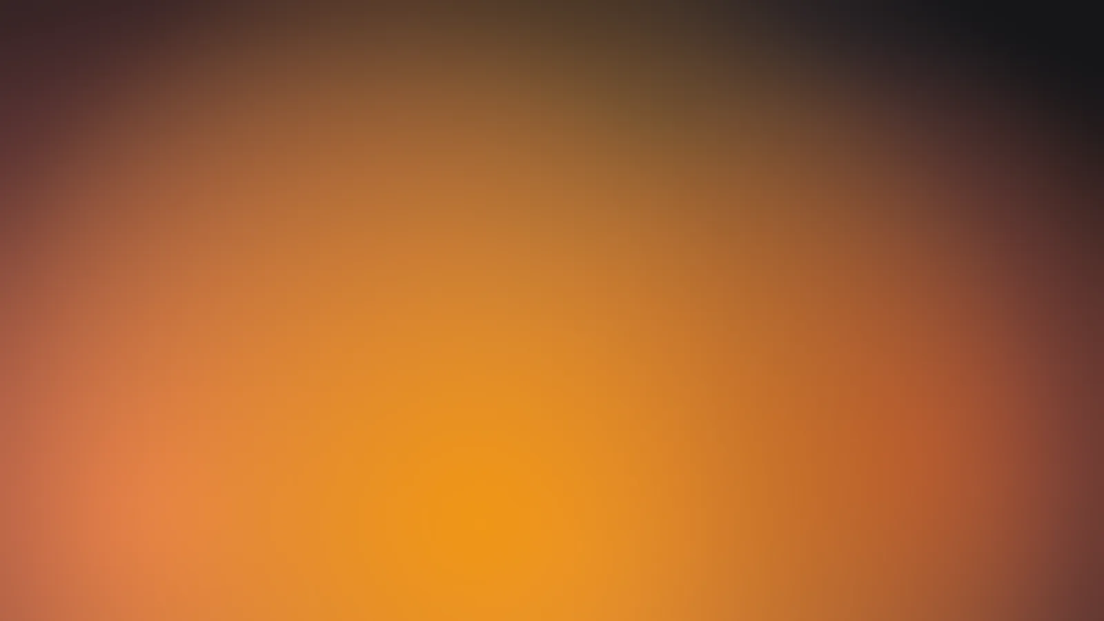 Coral and rose light over a dark ground