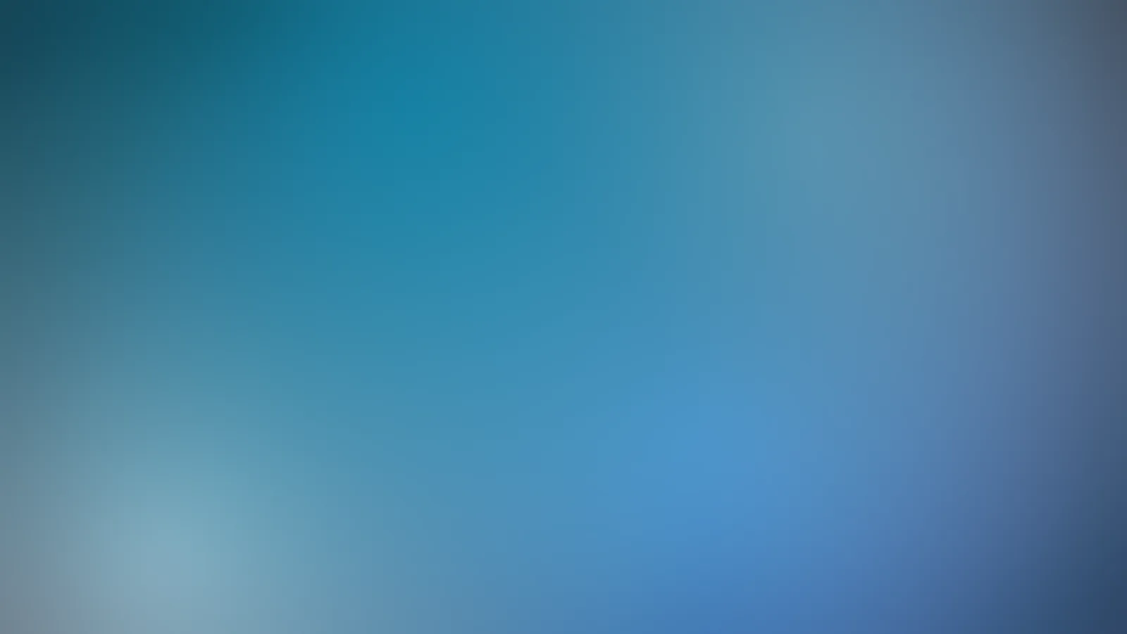 Slate gradient with a pale blue glow